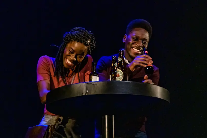 Tia (Allison Edwards-Crewe) and Steve (Tony Ofori) grab a few drinks. Photo: Barbara Zimonick